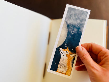 Handcrafted bookmark featuring a picture book style fox and moon illustration by artist Hayley Victoria.