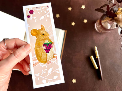 Mouse and blackberry bookmark shown with a fountain pen and open sketchbook on a cosy writing desk with soft botanical floral inspired styling.