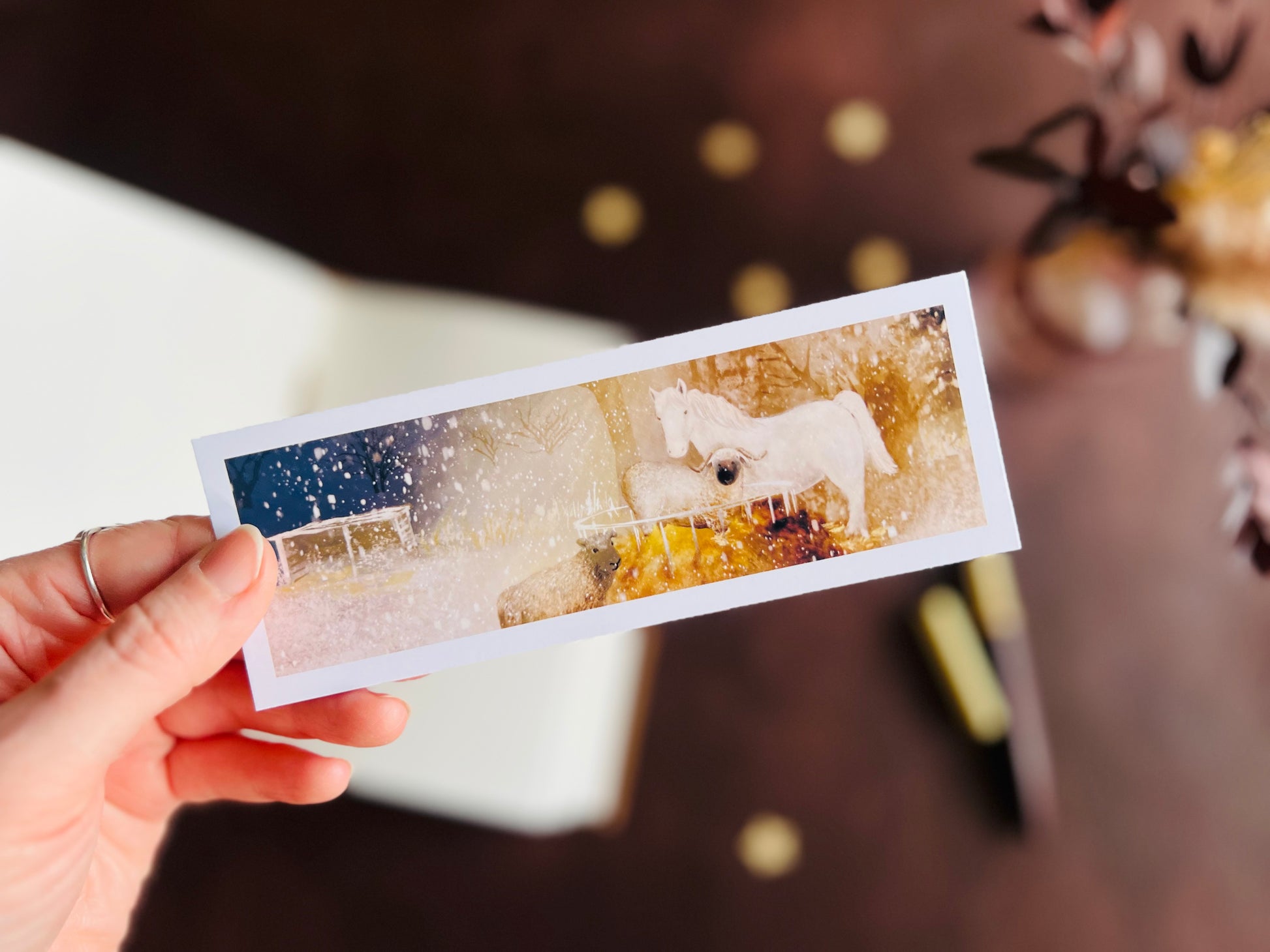 White horse illustration on an artisan bookmark. Handcrafted in East Yorkshire by UK artist Hayley Victoria. Cute animal picture o be used as reading gift. Magical, starry night scene.