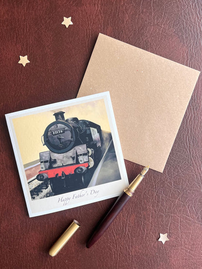 Illustrated North Yorkshire Moors Railway card featuring steam locomotive 80136, photographed flat with its accompanying kraft envelope. Ideal for Father’s Day and special family occasions.