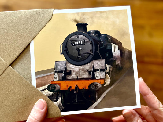 Premium illustrated greeting card featuring steam engine 80136 from the North Yorkshire Moors Railway on a yellow background. Art card design inspired by heritage steam trains, suitable for train enthusiasts and railway lovers.