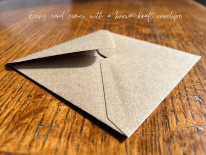 Premium recycled fleck kraft envelope shown on its own, supplied with a high quality illustrated greeting card. A 110gsm eco friendly envelope suitable for seasonal greeting cards, including winter and Christmas themed designs. Simple packaging from a UK independent artist.