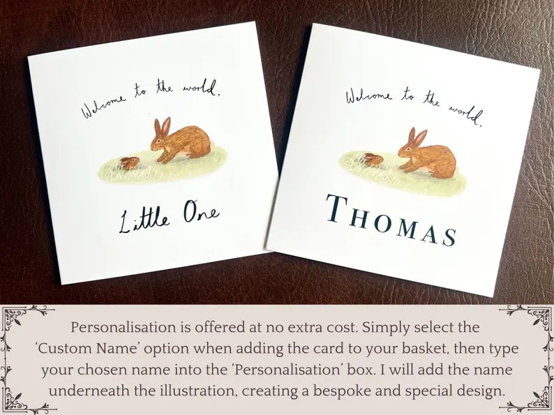 Infographic showing two versions of an artisan new baby card featuring a rabbit welcoming a baby bunny emerging from a burrow. The non-custom version reads 'Welcome to the world Little One', while the customised version includes a personalised name. Text at the bottom explains how to customise the card.