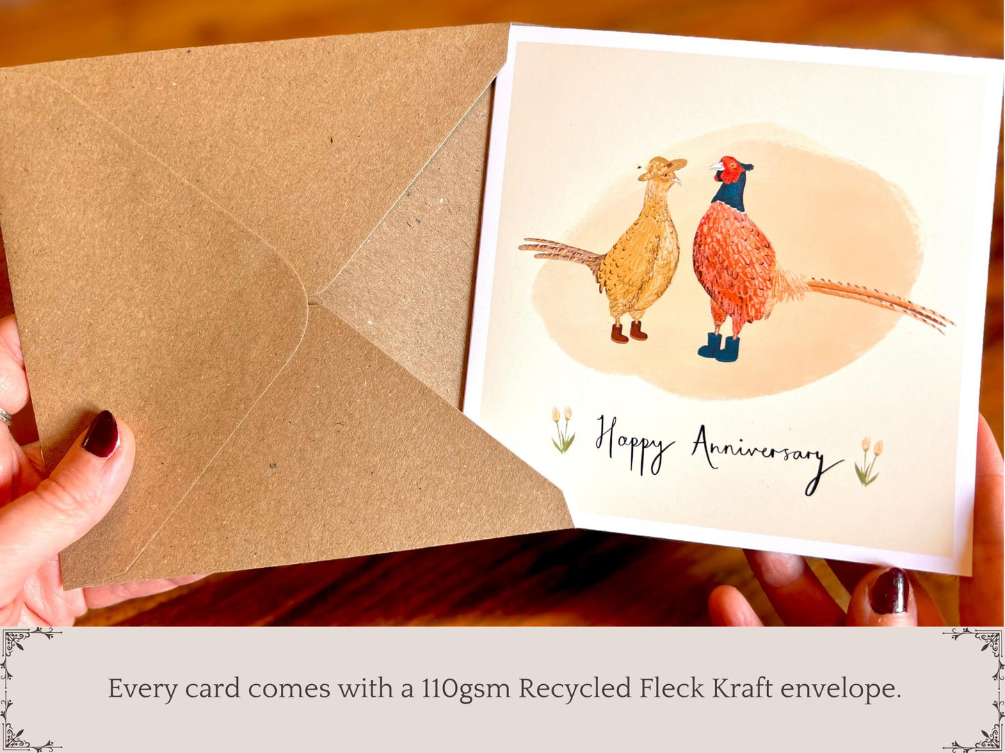 Infographic showing a greeting card being removed from a recycled fleck kraft envelope. Text underneath states “Every card comes with a 110gsm recycled fleck kraft envelope”. Premium illustrated greeting card packaging detail.