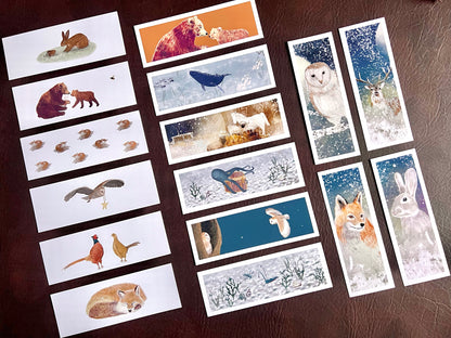 Full set of 16 illustrated animal bookmarks displayed on brown background, including woodland and ocean designs, ideal for wedding favours or book lovers.