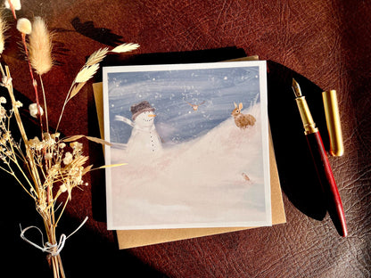 Snowman and Rabbit Christmas Card – Illustrated Winter Snow Scene