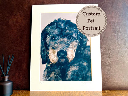 Custom dog pet portrait print of black dog in 11x14 mount, displayed on desk against dark brown wall with dried flowers, personalised artwork by UK artist